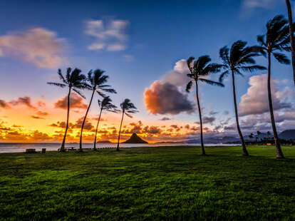 Dawn at Mokolii island in Kaneohe Bay, Hawaii from Kualoa Regional Park.