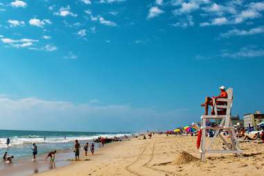 lifeguard stand overlooking crowded beach in ocean city, MD