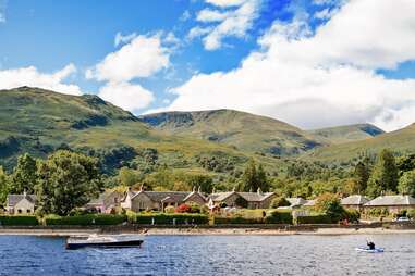 panoramic view of the village of luss from loch lomond
