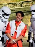 Frightened man surrounded by Stormtroopers at Disney World